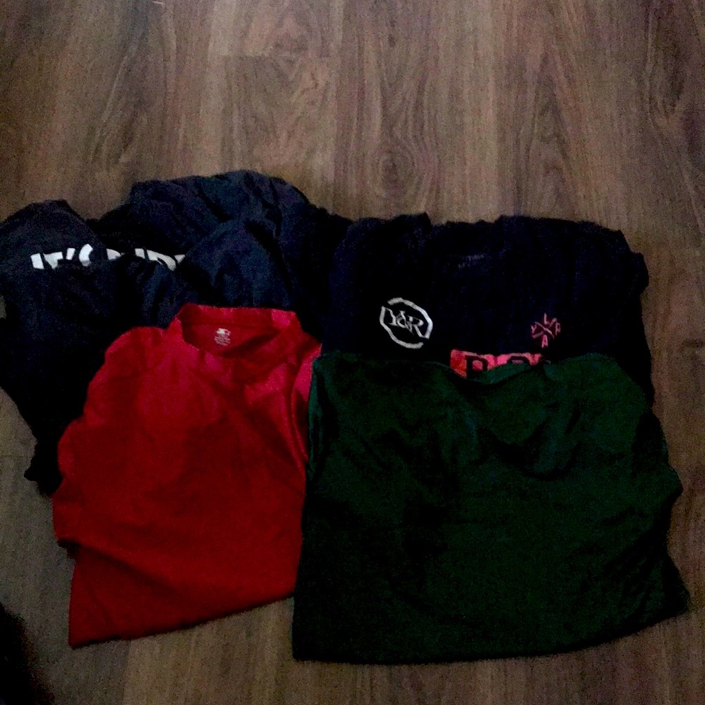 Five medium sized shirts